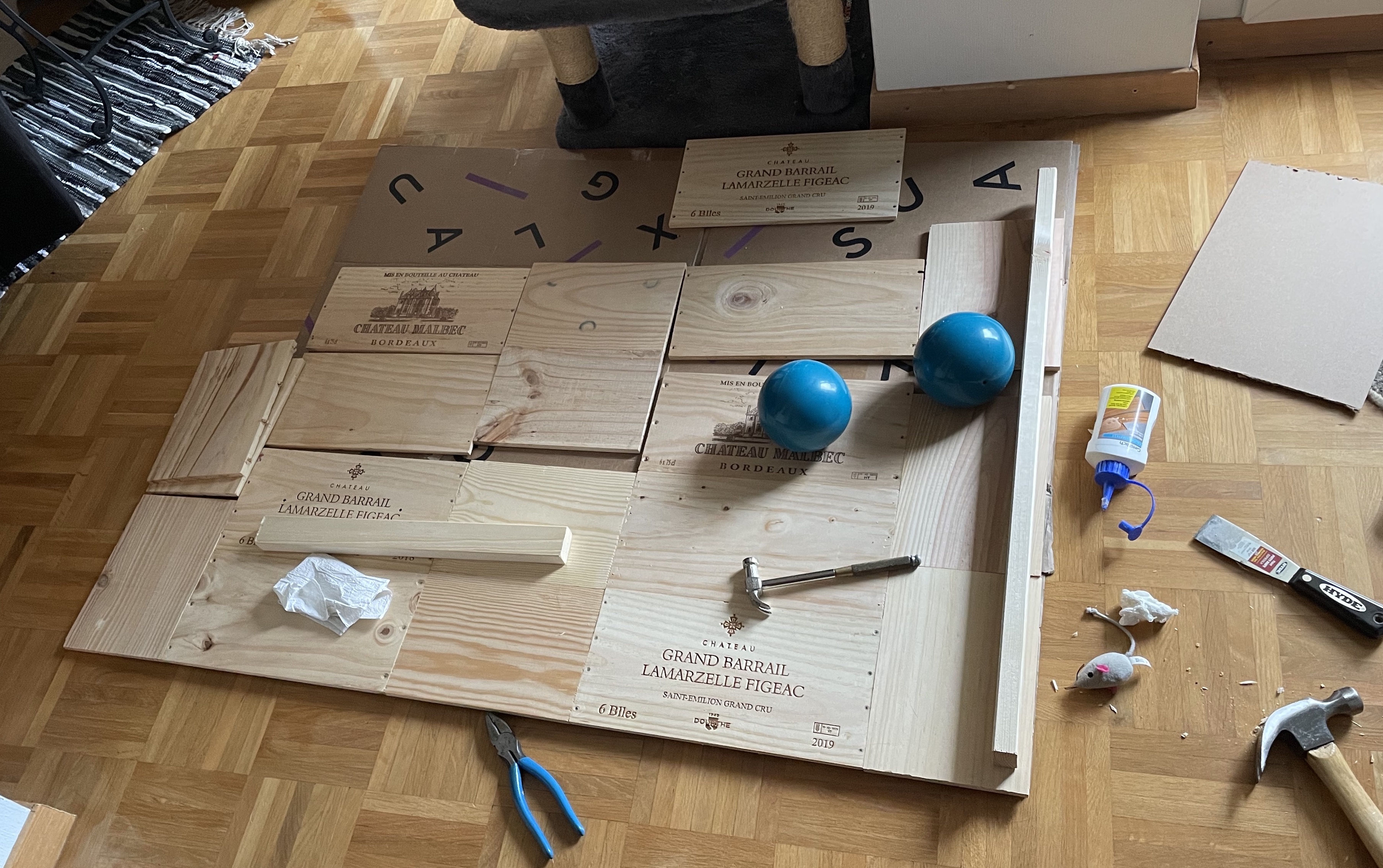 wine crate sides being assembled into desk top